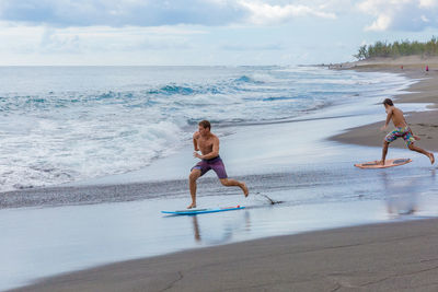 Man jumping on beach