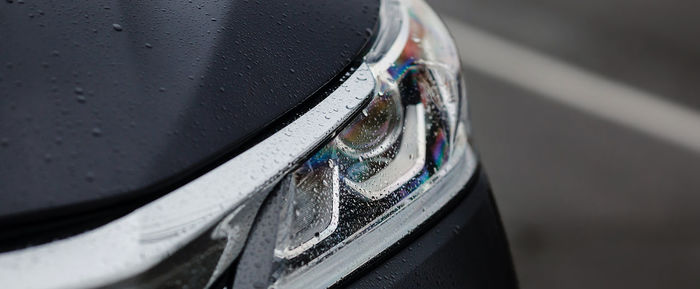 High angle view of wet car