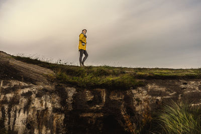 Full length of man standing against sky