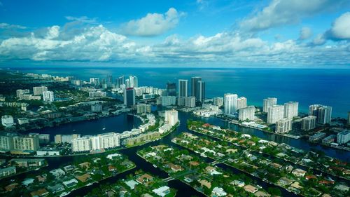 View of cityscape against blue sky