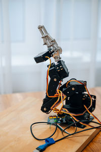 Close-up of camera on table