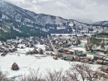Town with mountain range in background