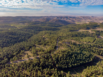 High angle view of agricultural landscape against sky