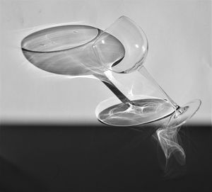 Close-up of empty glasses on table