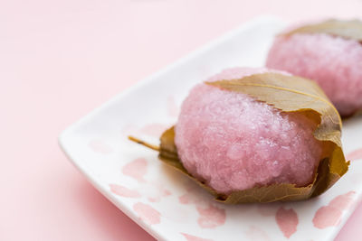 Sakura mochi , japanese traditional confectionery wrapped in salted cherry leaves
