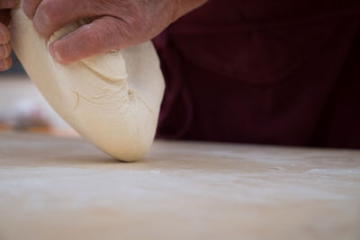 Close-up of person preparing food