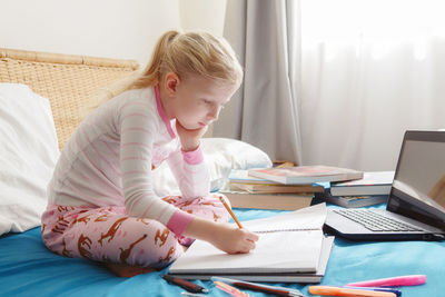 Girl studying at home