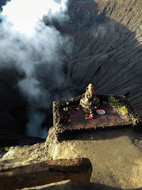 High angle view of statue against temple