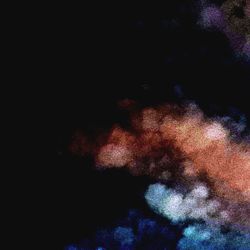 Low angle view of illuminated light against sky at night