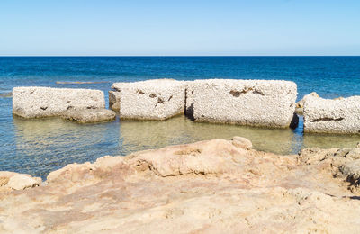 Scenic view of sea against clear sky