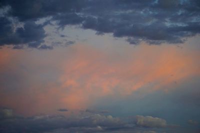 Low angle view of dramatic sky during sunset