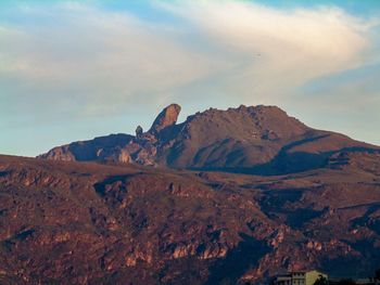 Scenic view of landscape and mountains against sky