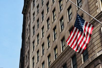 Low angle view of flag against sky