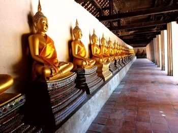 Statue of temple outside building