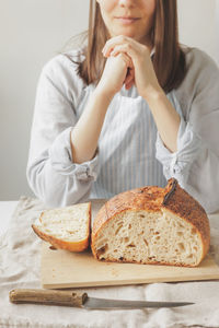 Midsection of woman having food