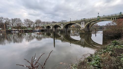 Bridge over river against sky