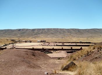 Scenic view of landscape against clear blue sky