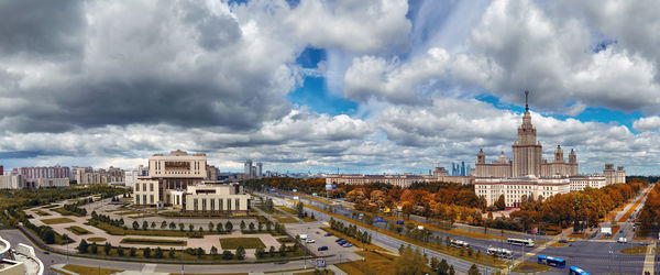 Panoramic view of buildings in city against sky