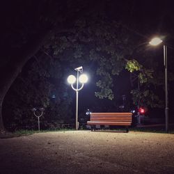 Illuminated street light at night