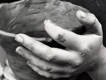 Close-up of hand holding ice cream