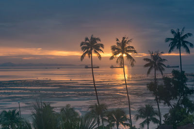 Scenic view of sea against sky at sunset