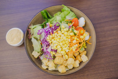 High angle view of chopped vegetables in bowl on table