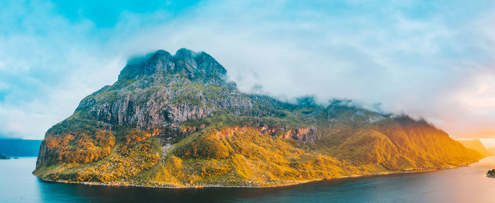 Aerial view of mountain by sea