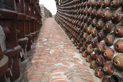 Cobblestone street amidst buildings