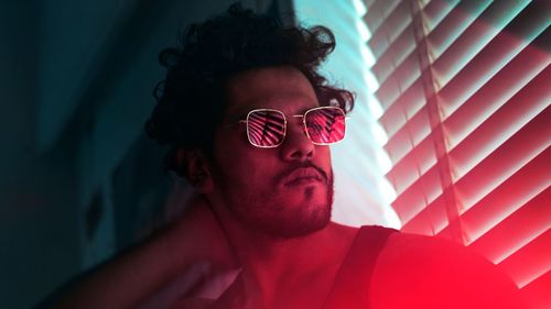 Portrait of young man wearing sunglasses