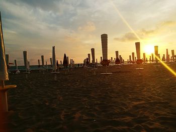 Silhouette of city at sunset