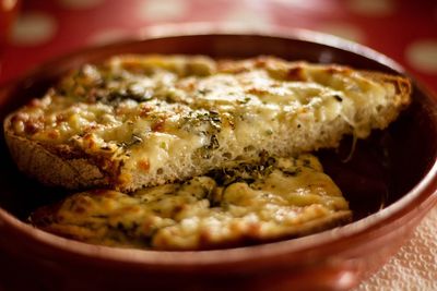 Close-up of pizza in bowl on table