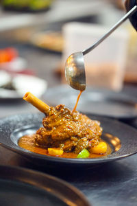 Close-up of food in plate on table