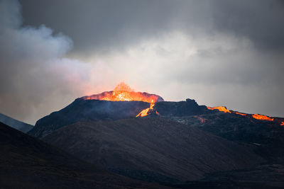 Scenic view of mountains against sky during sunset