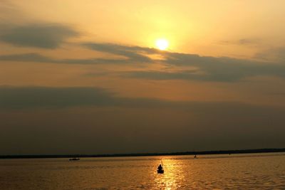 Scenic view of sea at sunset
