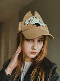 Portrait of woman wearing hat