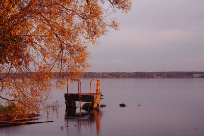 Scenic view of lake against sky during autumn