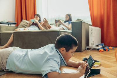 High angle view of mother and daughter at home