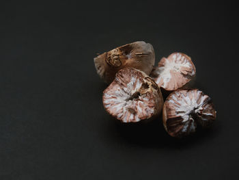 Close-up of garlic on black background