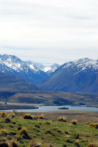 Scenic view of snowcapped mountains against sky