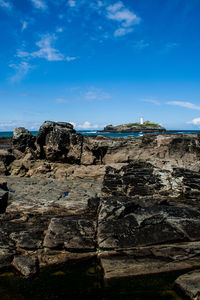 Rock formations against blue sky