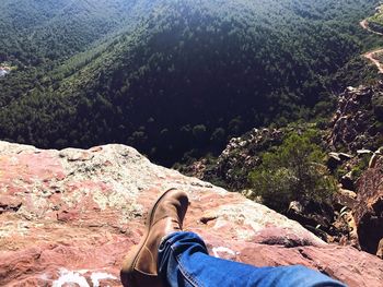 Low section of man on rock