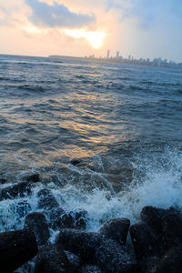 Scenic view of sea against sky during sunset