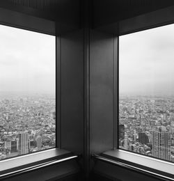 View of city through window