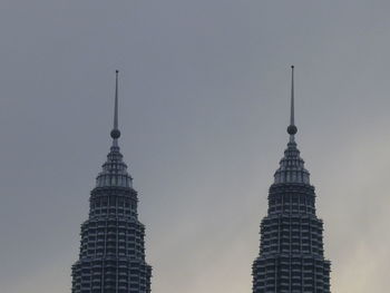 Low angle view of skyscrapers against sky