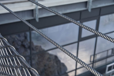 Close-up of rope tied to railing