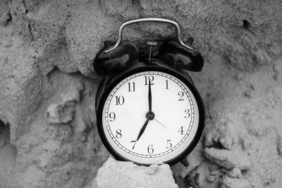 Low angle view of clock on wall