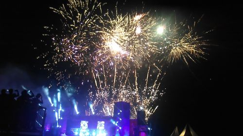 Low angle view of firework display
