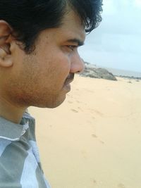 Side view of man on beach
