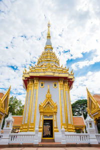 Low angle view of temple against building