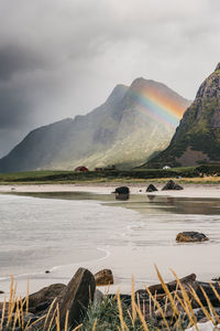 Scenic view of beach and mountains